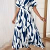 Robe Élégante Femme à Imprimé Abstrait Bleu Marine et Blanc (TEMU)