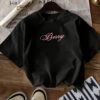 T-shirt noir pour femme avec motif de voiture de course rose (TEMU)