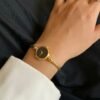 Montre-bracelet Mini Art Petite et Élégante, Style Rétro pour Femme avec un Tempérament Simple de Vie(TEMU)