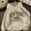 Sweat à capuche pour femme New York USA avec imprimé de lettres - Pull décontracté à manches longues avec lettrage(TEMU)
