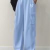 Pantalon cargo décontracté tricoté pour femmes avec imprimé alphabet et poches(TEMU)